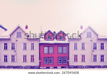 Cityscape of small town street with wooden houses in Norway with instagram effect retro vintage filter