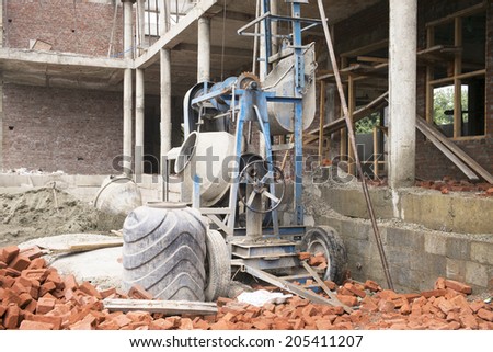 Industrial cement mixer machinery at construction site