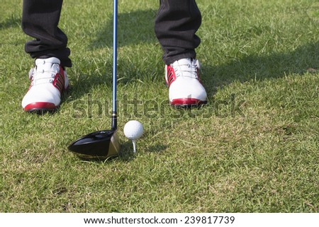 golfer ready to tee off