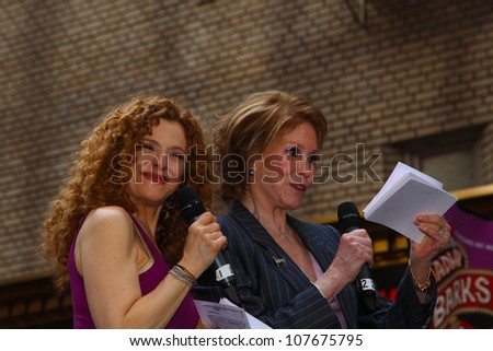NEW YORK CITY - 14 JULY 2012: Broadway Barks marks its 14th year with a celebrity-studded adoption fair in Shubert Alley. Bernadette Peters (lt) & Mary Tyler Moore on 14 July 2012 in New York City.