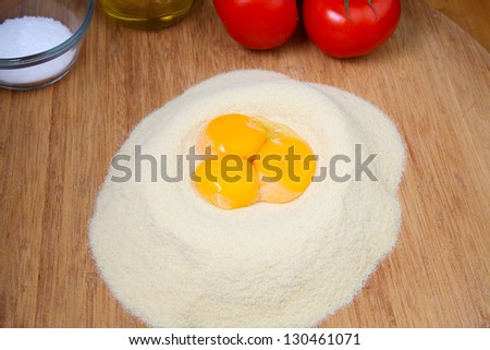 Mixing Pasta with Semolina Flour/Series on handmade pasta-making using traditional ingredients, eggs, yolks, olive oil, salt & hard semolina in place of AP flour.