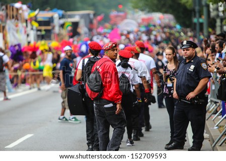 BROOKLYN, NEW YORK - SEPTEMBER 2 2013: The 46th annual West Indian Day Parade caps a long, holiday weekend of Caribbean-themed celebration as flamboyance fills Eastern Parkway on September 2 2013 in Brooklyn