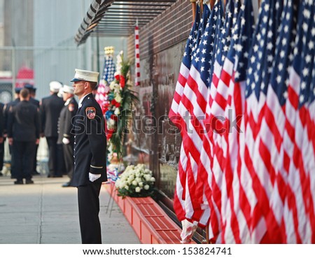 NEW YORK CITY - SEPTEMBER 11 2013: amid heightened security, family members, survivors & first responders gathered at Ground Zero to pay their respects to the fallen September 11 2013 in New York City