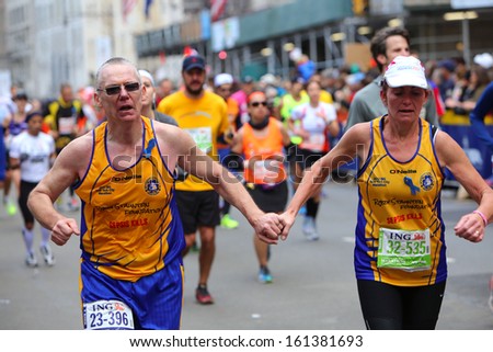 NEW YORK CITY - NOVEMBER 3 2013: the IMG New York City Marathon commenced after last year\'s hiatus. Colin & Stephanie Mathers run for the Rory Staunton Foundation November 3 2013 in New York City.