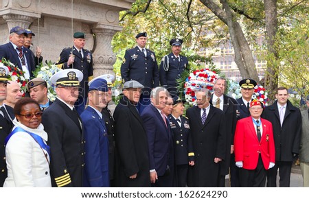 NEW YORK CITY - NOVEMBER 11 2013: Veterans\' Day was marked by a ceremonial wreath laying at the Eternal Light Monument in Madison Square Park & parade on Fifth Avenue November 11 2013 in New York City