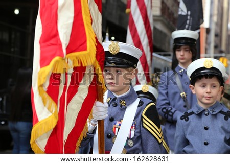 NEW YORK CITY - NOVEMBER 11 2013: Veterans\' Day was marked by a wreath laying at Madison Square Park followed by a parade along Fifth Avenue. Young cadets prepare November 11 2013 in New York City