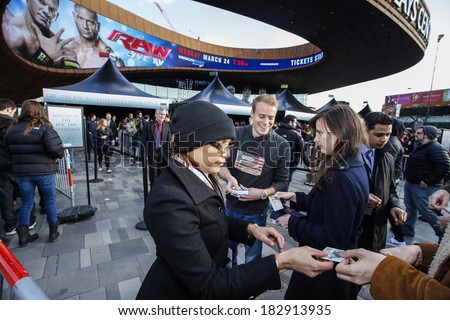 NEW YORK CITY - MARCH 20 2014: HBO\'s Game of Thrones series provides Brooklyn residents with a premiere of season four at the Barclay\'s Center. Checking IDs & distributing wristbands to fans