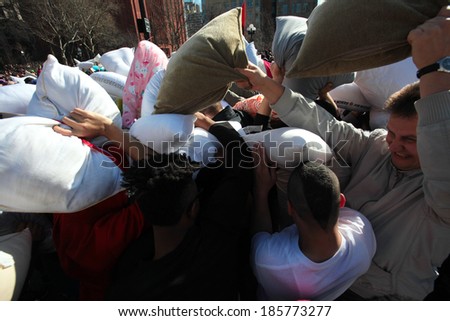 NEW YORK CITY - APRIL 5 2014: the first Saturday of April is International Pillow Fight Day, observed this time at Washington Square Park in Lower Manhattan. Drowning in a sea of pillows.