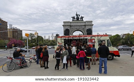 NEW YORK CITY - MAY 4 2014: the Prospect Park Alliance sponsors a bimonthly Food Truck Rally at Grand Army Plaza during spring & summer months.Kimchi Taco Korean Barbecue truck with arch in background