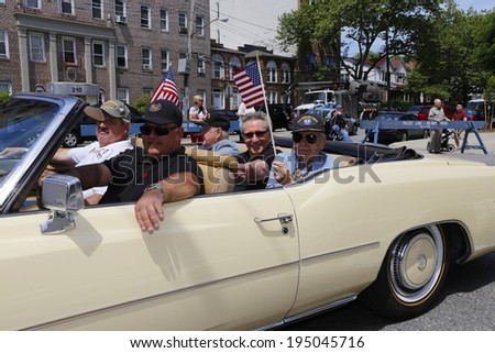 NEW YORK CITY - MAY 26 2014: The 146th annual King's County Memorial Day Parade, one of the nation's oldest, honored fallen & living veterans in the streets of Bay Ridge, Brooklyn. Vintage 1968 Impala