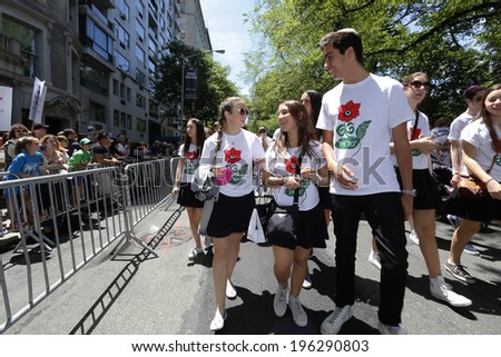 NEW YORK CITY - JUNE 1 2014: The 50th annual Israel Day Parade filled Fifth Avenue with politicians, revelers & a few protestors marking Israel\'s 66th anniversary. Teens marching up Fifth Avenue