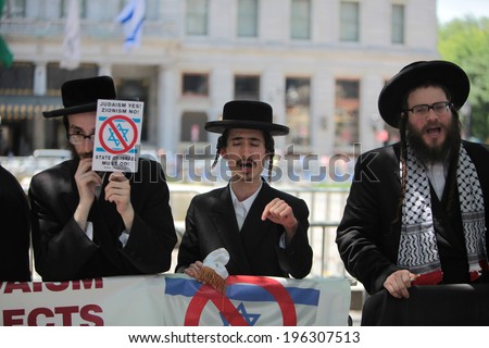 NEW YORK CITY - JUNE 12014: The 50th annual Israel Day Parade drew thousands to the Upper East Side of Manhattan to honor the state\'s 66th anniversary.  Neturei Karta protesting Zionism