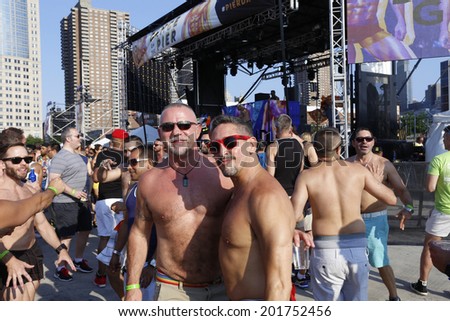 NEW YORK CITY - JUNE 29 2014: Heritage of Pride sponsored a post Pride Parade Dance on Pier 26 in Tribeca attended by several thousand celebrants.