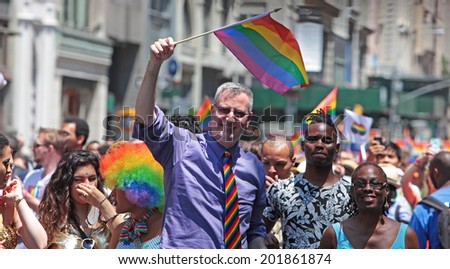 NEW YORK CITY - JUNE 29 2014: Celebrating the 45th anniversary of the Stonewall Riots & beginning of the modern gay rights movement, thousands marched along Fifth  Avenue. NYC Mayor Bill de Blasio