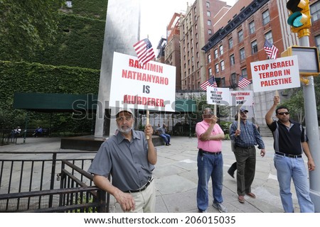 NEW YORK CITY - JULY 19 2014: More than a dozen Muslim-American men protested Israeli Prime Minister Benjamen Netanyahu & Israeli actions in Gaza in front of the United Nations building on First Ave