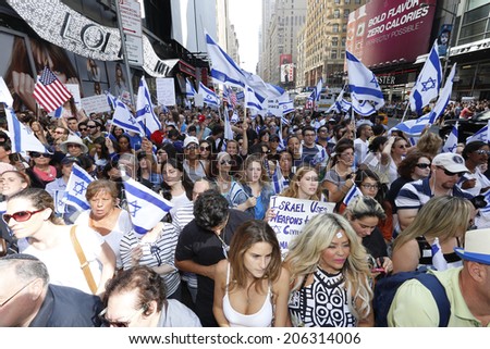 NEW YORK CITY - JULY 20 2014: several thousand supporters of Israeli actions in Gaza staged a rally in Times Square. Crowd filling 7th Avenue