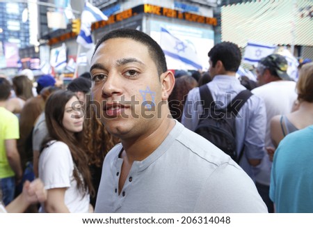 NEW YORK CITY - JULY 20 2014: several thousand supporters of Israeli actions in Gaza staged a rally in Times Square. Man with Star of David on his face