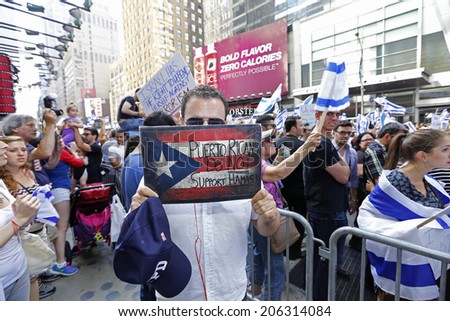 NEW YORK CITY - JULY 20 2014: several thousand supporters of Israeli actions in Gaza staged a rally in Times Square. Puerto Rican Israel supporter