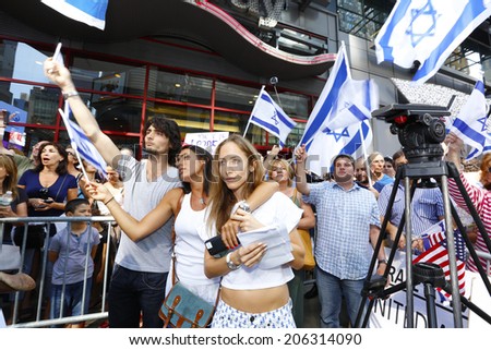 NEW YORK CITY - JULY 20 2014: several thousand supporters of Israeli actions in Gaza staged a rally in Times Square. Young women