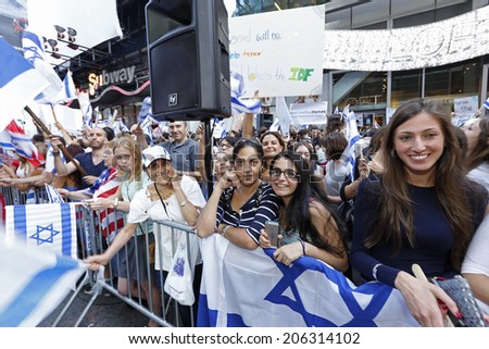 NEW YORK CITY - JULY 20 2014: several thousand supporters of Israeli actions in Gaza staged a rally in Times Square. Attendees lined on 7th Avenue with flags