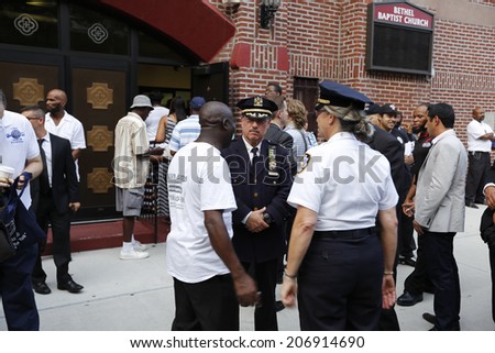 NEW YORK CITY - JULY 23 2014: Funeral services for Eric Garner, the Staten Island resident who died while being taken into custody by NYPD.  Community Affairs Bureau chief Joanne Jaffe with mourners