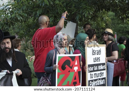 NEW YORK CITY - JULY 25 2014: ADULAH NY, a organization dedicated to divestiture from Israel, staged a protest & march in Lower Manhattan against Israeli actions in Gaza.