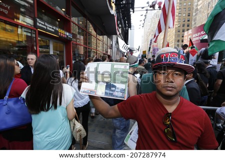 NEW YORK CITY - JULY 25 2014: Al Awda, an organization dedicated to the right of return for all Palestinians to Israel held a rally in Times Square on Al-Quds day, the last Friday of Ramadan