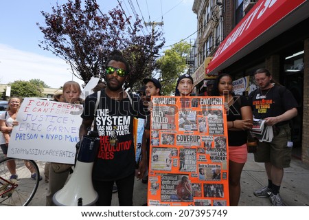 NEW YORK CITY - JULY 27 2014: Black Lawyers for Justice & the New Black Panther Party staged a rally in Staten Island calling for a federal investigation into Eric Garner's death at the hands of NYPD
