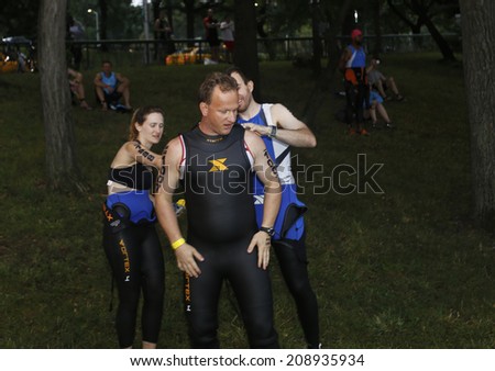 NEW YORK CITY - AUGUST 3 2014:  the 14th annual NYC Triathlon saw approximately 4000 participants of various age & skill levels swim the Hudson River, bike around Manhattan & finish in Central Park