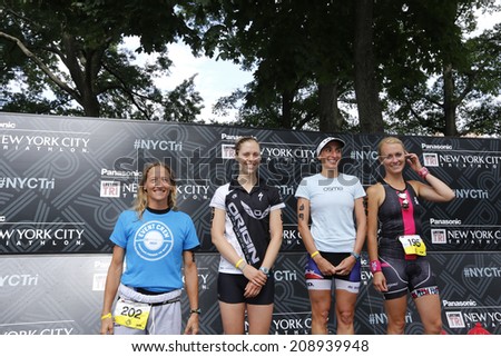 NEW YORK CITY - AUGUST 3 2014:  the 14th annual NYC Triathlon saw approximately 4000 participants of various age & skill levels swim the Hudson River, bike around Manhattan & finish in Central Park