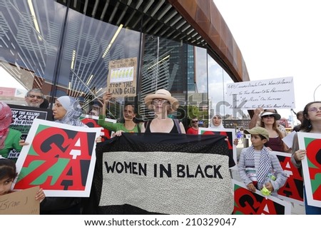 NEW YORK CITY - AUGUST 10 2014: a Remembrance for Gaza was held with a rally in Barclay\'s Center Brooklyn followed by a silent march through Fort Greene to the church of St Luke & St Matthew
