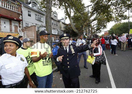 NEW YORK CITY - AUGUST 23 2014: thousands of demonstrators marched in Staten Island to demand justice for Eric Garner, Michael Brown & other alleged victims of police brutality.