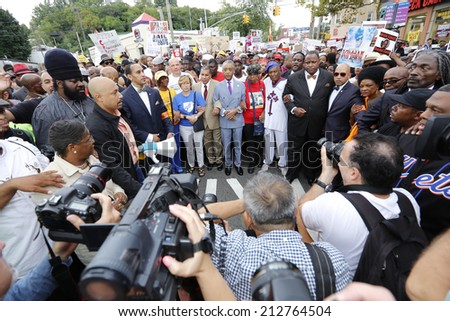 NEW YORK CITY - AUGUST 23 2014: thousands rallied in Staten Island demanding justice & accountability in the deaths of Eric Garner, Michael Brown & other victims of alleged police brutality