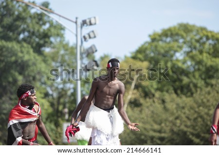 NEW YORK CITY - AUGUST 1 2014: West Indian Day Carnival parade on Labor Day draws more than a million spectators as it celebrates Caribbean culture along Eastern Parkway in Brooklyn.