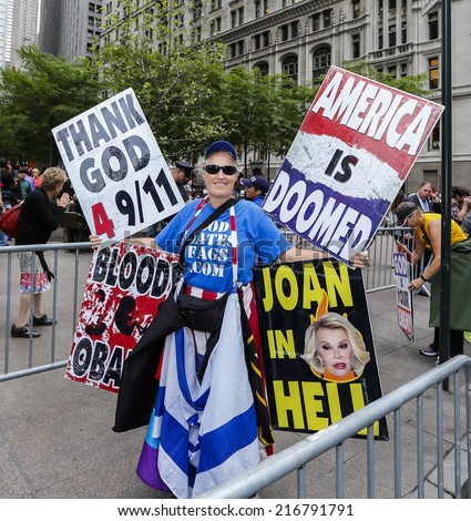 NEW YORK CITY - SEPTEMBER 11 2014:members of Westboro Baptist Church appeared in front of Ground Zero during memorial services on the 13th anniversary of the WTC attacks with signs praising the attack