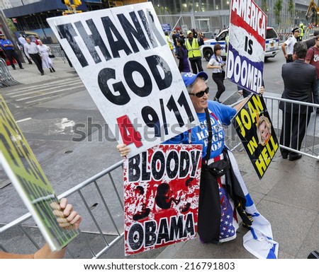 NEW YORK CITY - SEPTEMBER 11 2014:members of Westboro Baptist Church appeared in front of Ground Zero during memorial services on the 13th anniversary of the WTC attacks with signs praising the attack