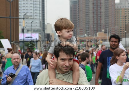 NEW YORK CITY - SEPTEMBER 21 2014: the People's Climate March in Manhattan brought several hundred thousand people for a march from Columbus Circle through Midtown calling attention to global warming