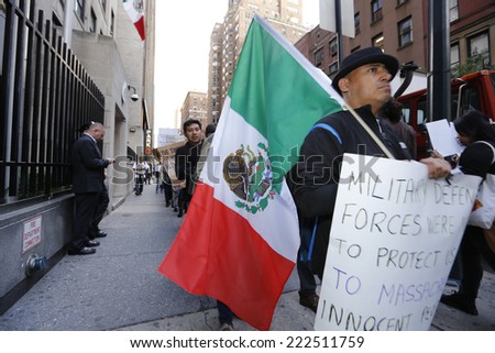 NEW YORK CITY - OCTOBER 8 2014: activists protested in front of the Mexican consulate demanding the Mexican government account for the kidnapping and murder of 43 students from the Ayotzinpapa school