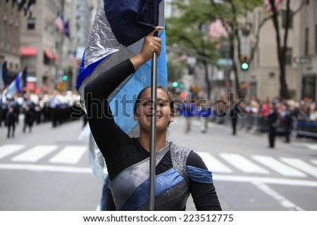 NEW YORK CITY - OCTOBER 13 2014: the 70th annual Columbus Day parade filled Fifth Avenue with thousands of marchers celebrating the pride of Italian heritage. High school drill team