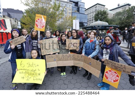NEW YORK CITY - OCTOBER 22 2014: Stop Mass Incarcerations Network sponsored a Day of Resistance rally at Union Square Park followed by a march to Times Square in protest of nationwide police brutality