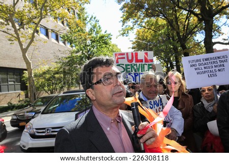 NEW YORK CITY - OCTOBER 26 2014: the Cobble Hill Association, Concerned Physicians of LICH, community members & officials gathered in Cobble Hill to protest the sale of Long Island Community Hospital