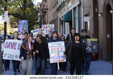 NEW YORK CITY - OCTOBER 26 2014: the Cobble Hill Association, Concerned Physicians of LICH, community members & officials gathered in Cobble Hill to protest the sale of Long Island Community Hospital