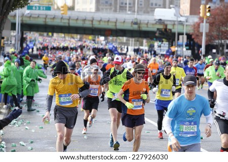 NEW YORK CITY - NOVEMBER 2 2014: the 43rd annual NYC Marathon saw more than 50,000 entrants race through all five boroughs. Runners fill Fourth Avenue, Brooklyn at mile four mark
