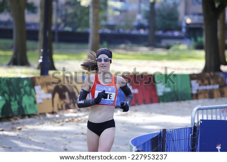 NEW YORK CITY - NOVEMBER 2 2014: the 43rd annual New York City Marathon saw more than 50,000 entrants run through all five boroughs. Women's elite runner Kate Goucher enters Central Park