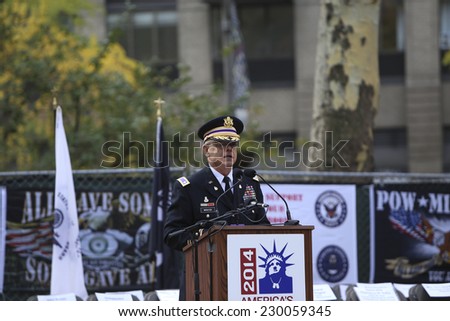 NEW YORK CITY - NOVEMBER 11 2014: the 95th annual Veteran\'s Day parade along Fifth Avenue is the largest Nov 11 celebration in the United States. Master of Ceremonies Colonel Dwight Webster