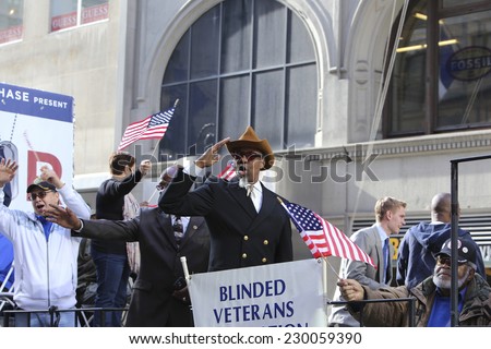 NEW YORK CITY - NOVEMBER 11 2014: the 95th annual Veteran\'s Day parade along Fifth Avenue is the largest Nov 11 celebration in the United States. Blind veterans association on flat