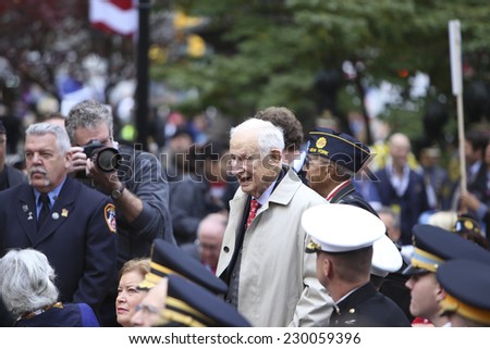 NEW YORK CITY - NOVEMBER 11 2014: the 95th annual Veteran\'s Day parade along Fifth Avenue is the largest Nov 11 celebration in the United States. Former Manhattan DA Robert Morgenthau