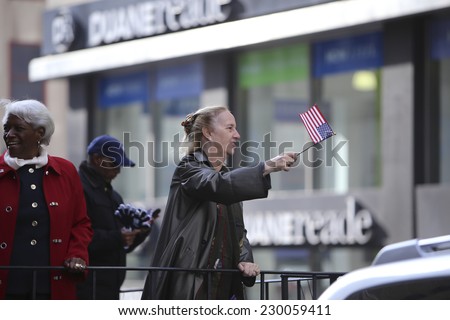 NEW YORK CITY - NOVEMBER 11 2014: the 95th annual Veteran\'s Day parade along Fifth Avenue is the largest Nov 11 celebration in the United States. Manhattan borough president Gail Brewer