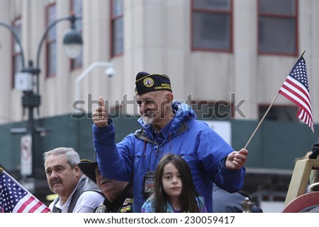 NEW YORK CITY - NOVEMBER 11 2014: the 95th annual Veteran\'s Day parade along Fifth Avenue is the largest Nov 11 celebration in the United States.