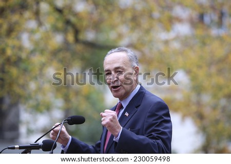 NEW YORK CITY - NOVEMBER 11 2014: the 95th annual Veteran\'s Day parade along Fifth Avenue is the largest Nov 11 celebration in the United States. US Senator Charles Schumer speaks at Madison Park